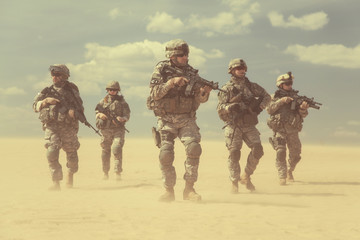 infantrymen in action - obrazy, fototapety, plakaty