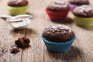 muffins with chocolate in colorful molds