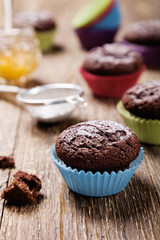 muffins with chocolate in colorful molds