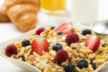 Light, delicious breakfast with cereal and fruit.