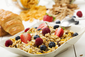 Light, delicious breakfast with cereal and fruit.