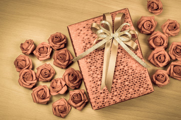 red gift box on wood background