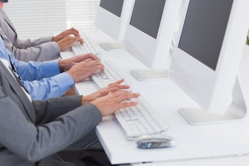 Business team working on computers 