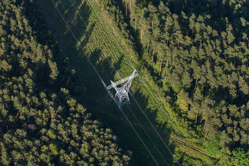 Aerial view of electrical wires large scale power energy tower i