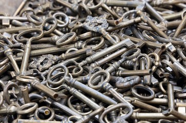 bunch of old brass and bronze keys for sale at flea market