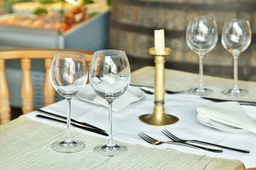 Table setting with wine glasses at the vintage cafe.