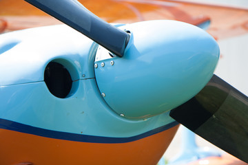 Light aircraft, modern biplane orange and blue