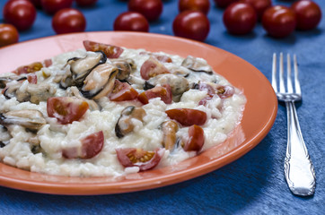 Risotto with seafood and tomatoes 