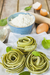 Traditional italian raw homemade spinach pasta