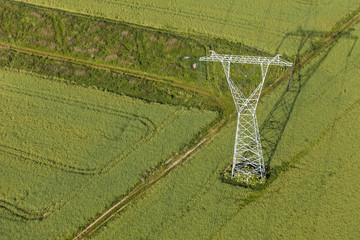 Aerial view of electrical wires large scale power energy tower