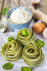 Traditional italian raw homemade spinach pasta