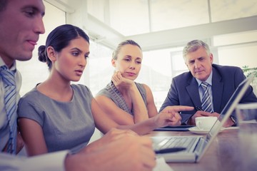 Concentrated business team during meeting