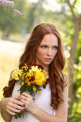 Beautiful redhair bride outdoors
