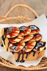 Banana bread topped with chocolate.