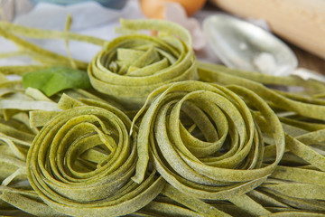 Traditional italian raw homemade spinach pasta