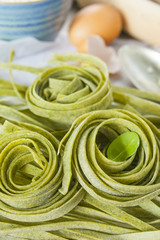 Traditional italian raw homemade spinach pasta
