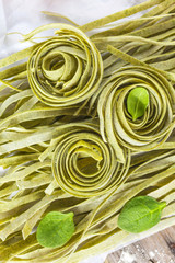 Traditional italian raw homemade spinach pasta