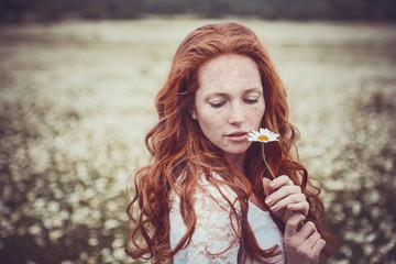 Beautiful woman enjoying field, harmony concept