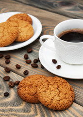 Cup of coffee and oatmeal cookies
