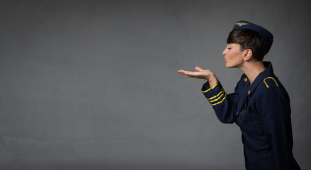 hostess blowing kisses with open hand