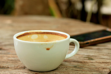 Dinking coffee with smart phone