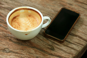 Dinking coffee with smart phone