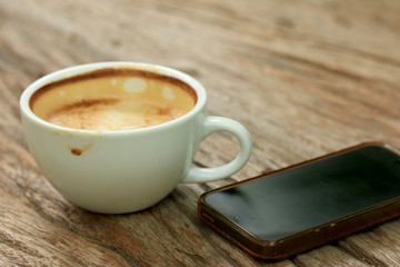 Dinking coffee with smart phone