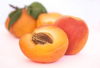 ripe apricots in white background