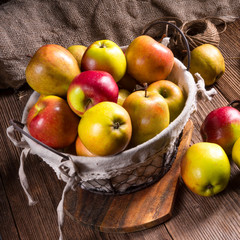 Fresh autumn apples in the basket