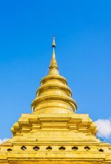 Fototapeta premium old temple with white cloud and blue sky