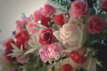 Beautiful vintage roses of artificial flowers