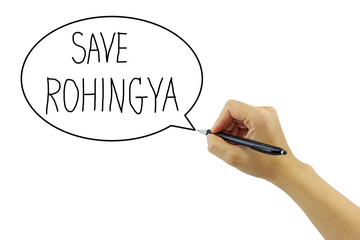 hand with pen writing Save Rohingya refugee from human trafficki