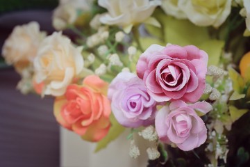 Beautiful vintage roses of artificial flowers