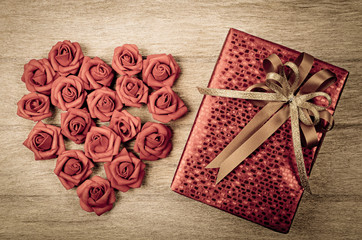 red gift box on wood background