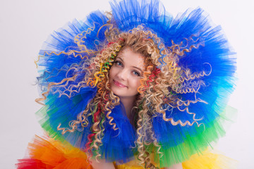 rainbow smiling girl on a white background