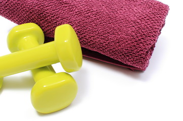 Dumbbells and towel for using in fitness