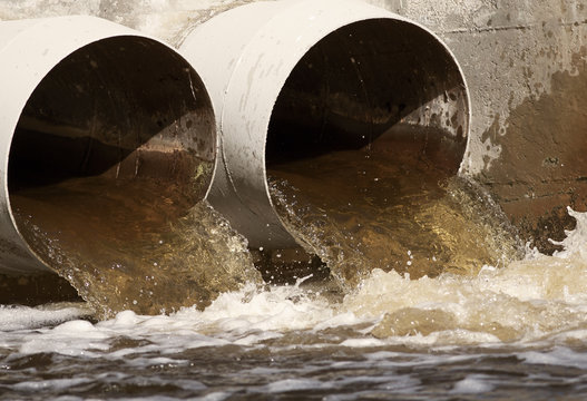 Toxic Covid Coronavirus Water Running From A Sewer To The River