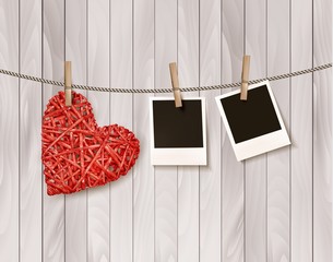Red wooden heart with photographs. Vector.