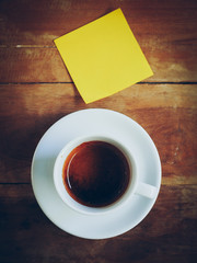 cup of coffee and short note paper