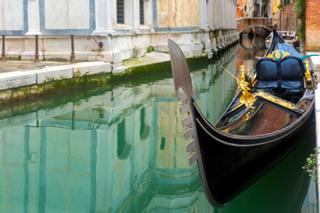 Fototapeta na wymiar Gondola in Venice canal, Italia