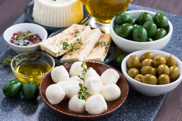 cheeses - mozzarella, feta cheese and pickles