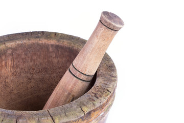 wooden mortar and pestle isolated on white background