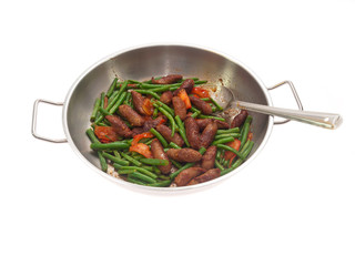 fried merguez sausages with green beans and tomatoes