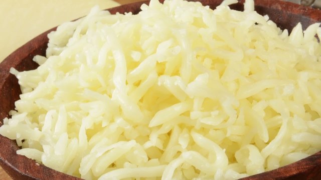 bowl of shredded mozzarella cheese