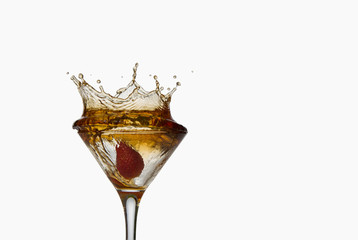 Strawberries,cocktail with splash isolated on white background 