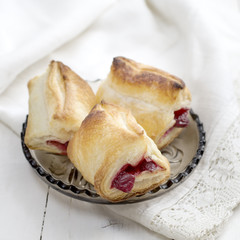Puff Pastry Cherry Turnovers on desk