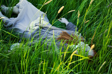 Dead Woman Laying in Grass