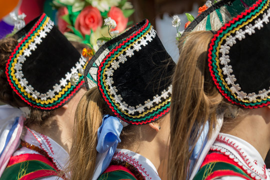 Heads of tree girls in ethnic headdress, Kurpie region, Poland