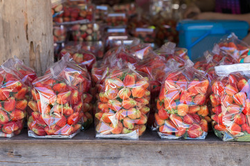 strawberry juicy fruit in plastic bag packaging