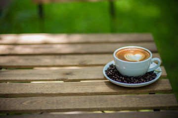 Latte Art coffee with coffee bean